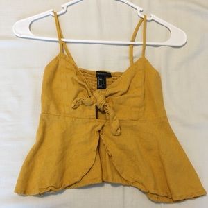 Yellow tied up crop top